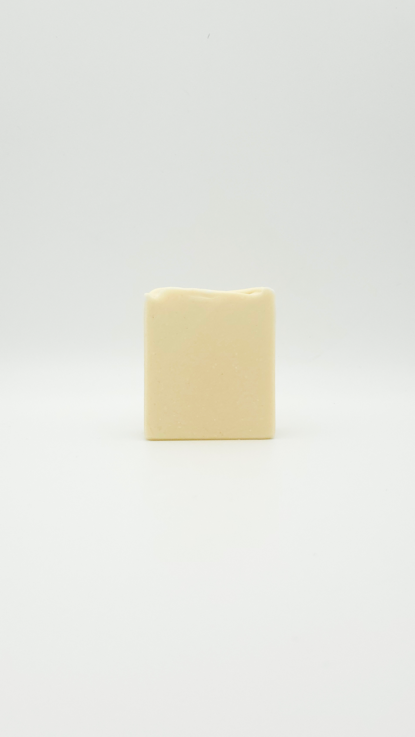 Handmade goat milk and neem natural soap bar with eco packaging by Latheray