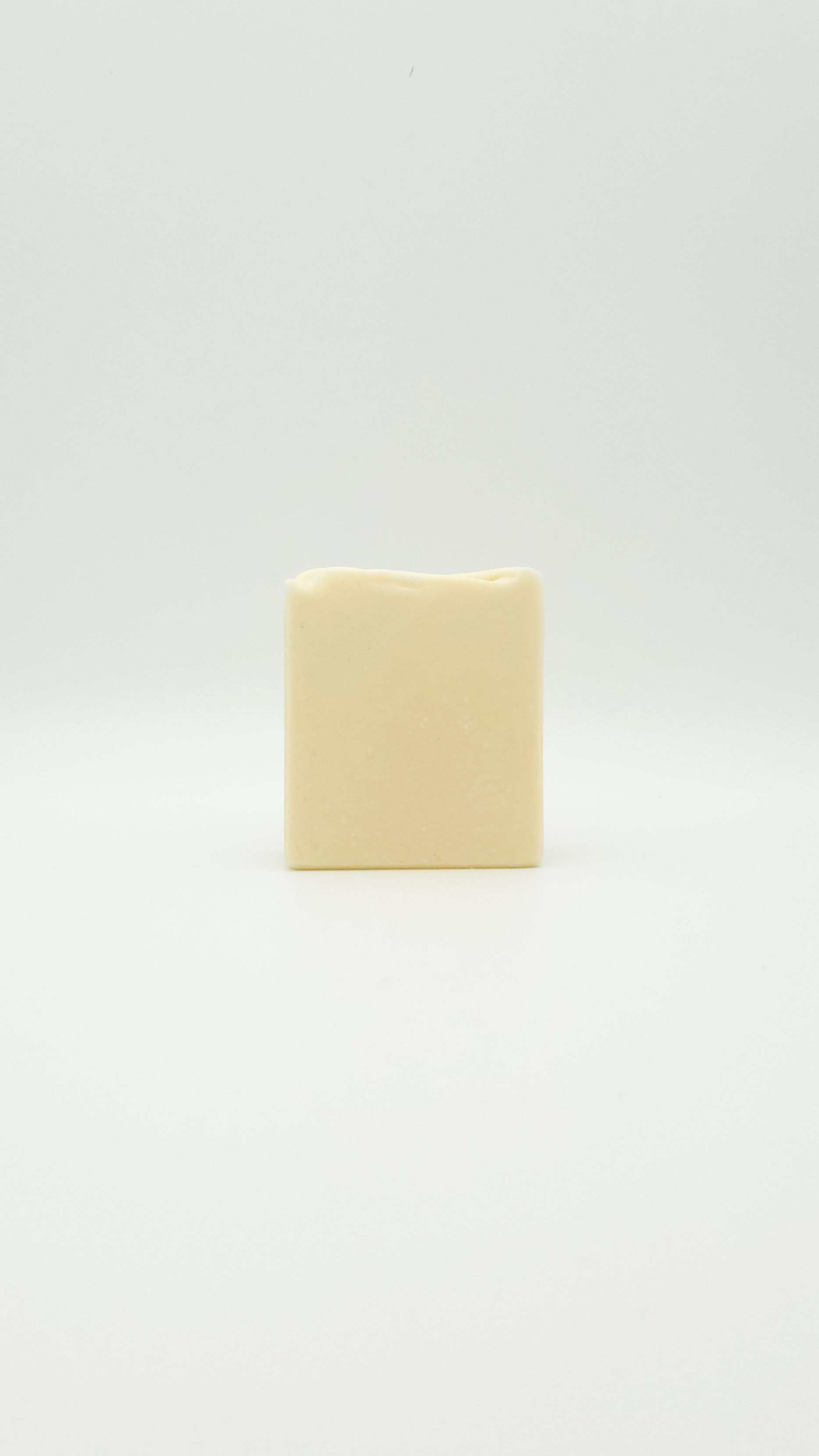 Handmade goat milk and neem natural soap bar with eco packaging by Latheray