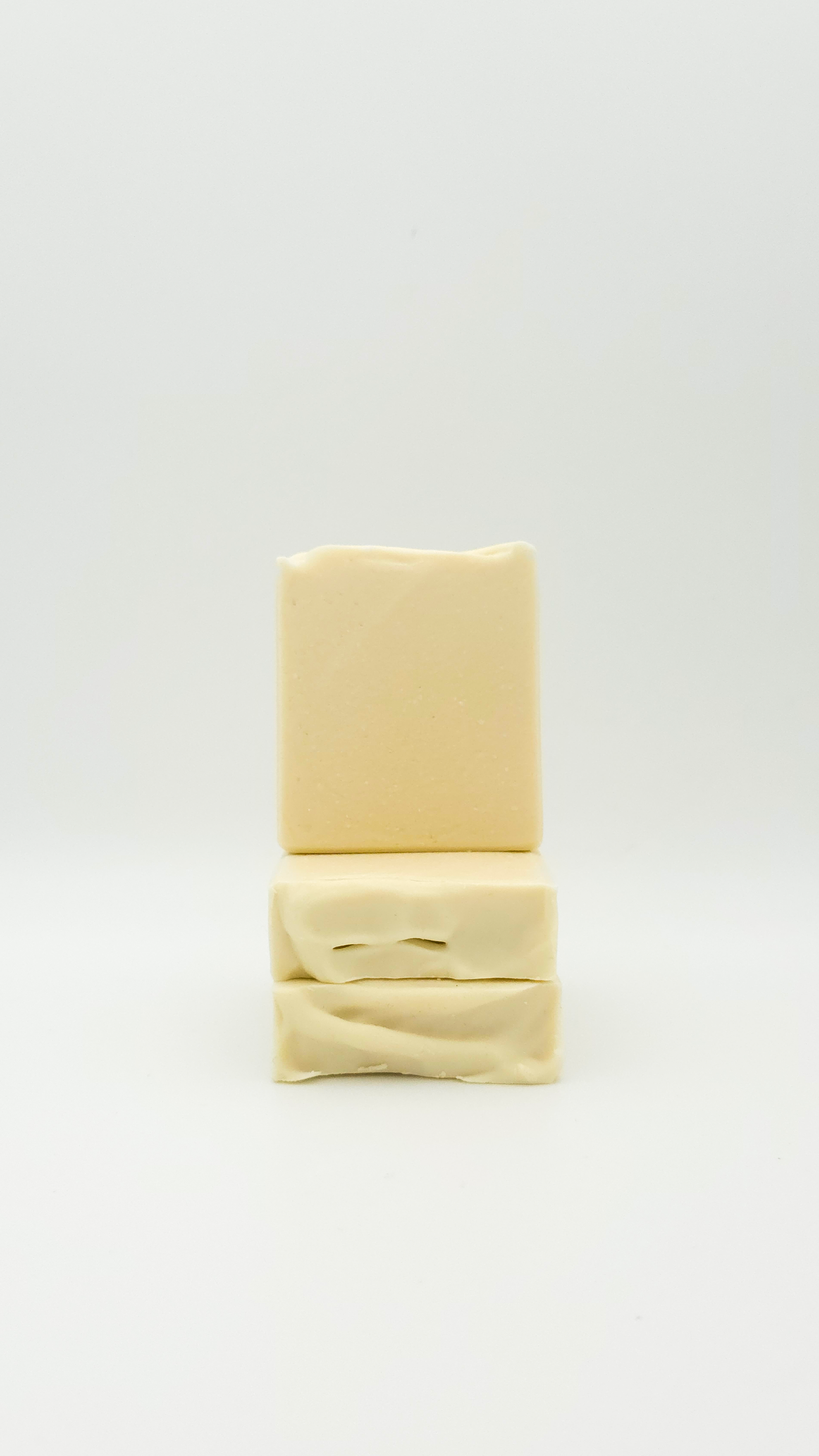 Handmade goat milk and neem natural soap bar with eco packaging by Latheray