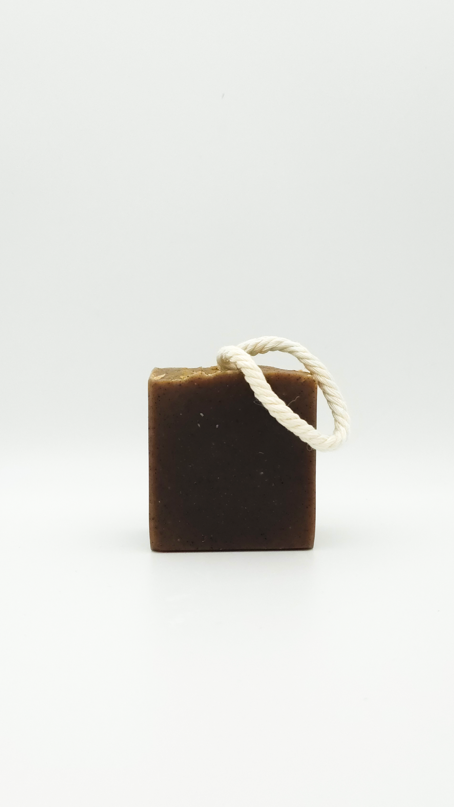 Handmade amber natural soap bar with warm, earthy fragrance by Latheray.